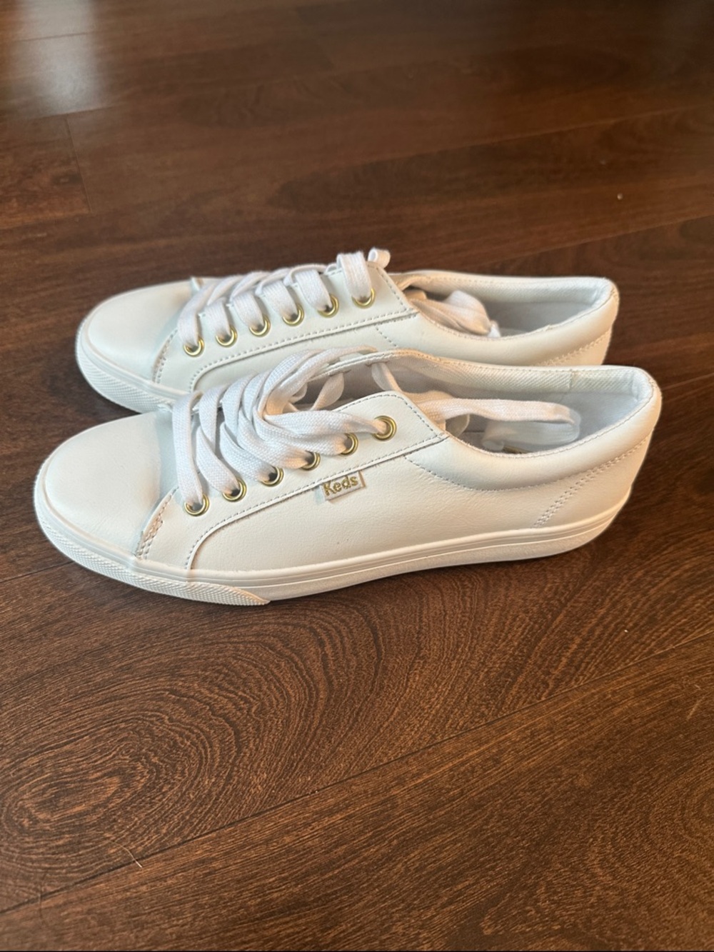 Keds White Low-Top Sneakers with Gold Eyelets and Logo